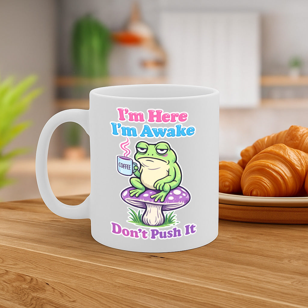 I'm Here, I'm Awake, Don't Push It Funny Coffee Mug – 11oz White Ceramic Mug, Grumpy Frog with Coffee Cartoon, Morning Humor Design, Cute Sarcastic Gift – Design MG6847